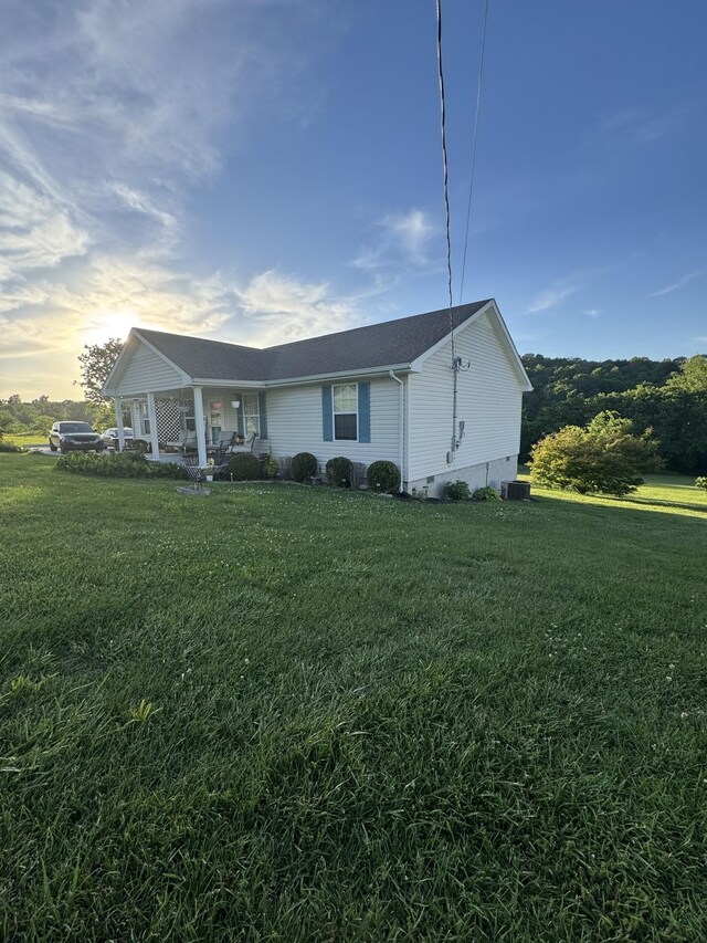 162 Pigeon Roost Rd, Brush Creek, TN 38547 - view of front facade with a front yard and central AC