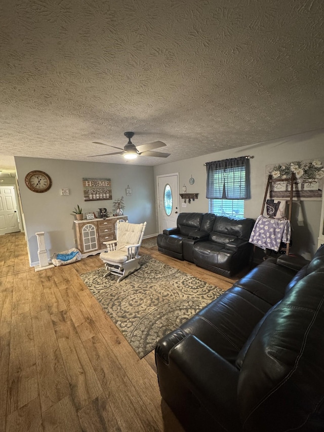 162 Pigeon Roost Rd, Brush Creek, TN 38547 - living room featuring a ceiling fan, hardwood / wood-style flooring, and a textured ceiling