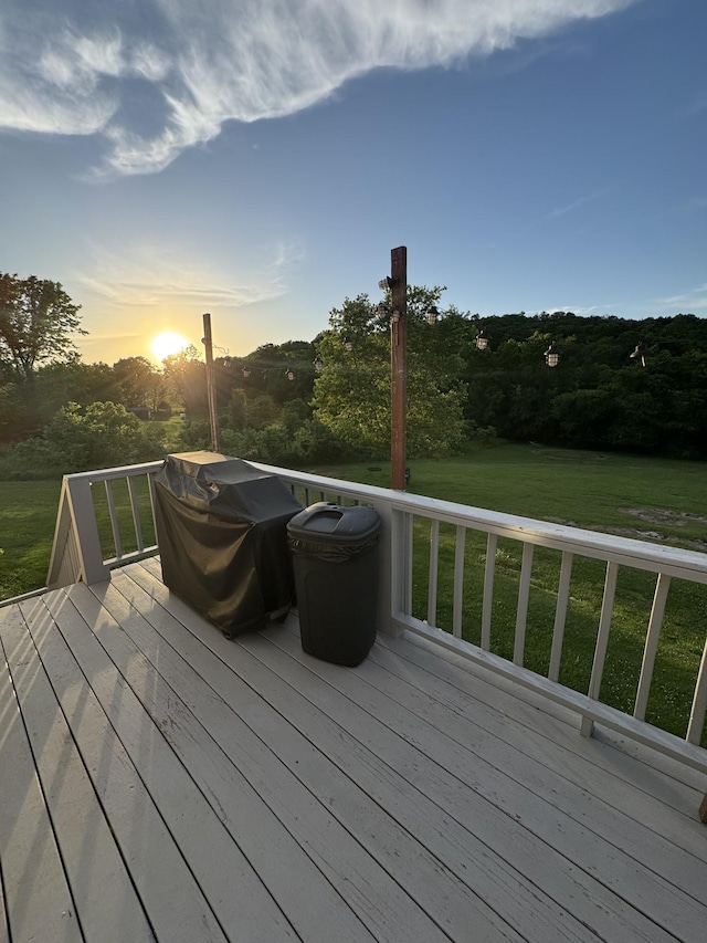 162 Pigeon Roost Rd, Brush Creek, TN 38547 - deck at dusk with a yard