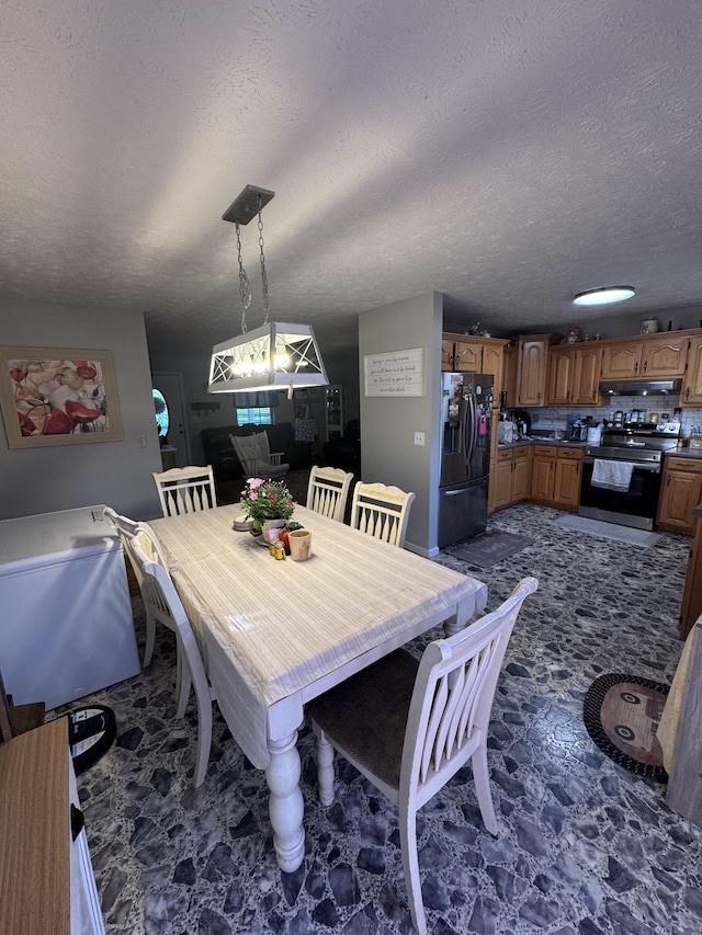 162 Pigeon Roost Rd, Brush Creek, TN 38547 - dining area featuring a textured ceiling