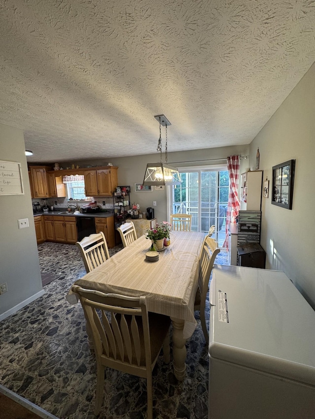 162 Pigeon Roost Rd, Brush Creek, TN 38547 - dining area featuring plenty of natural light and a textured ceiling