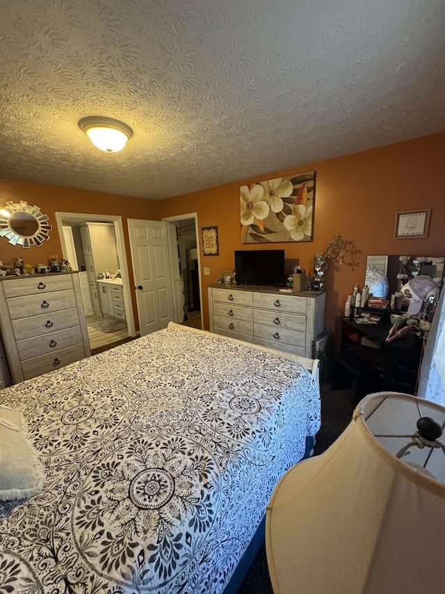 162 Pigeon Roost Rd, Brush Creek, TN 38547 - bedroom featuring a textured ceiling and ensuite bathroom