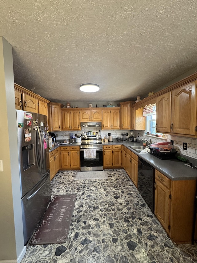 162 Pigeon Roost Rd, Brush Creek, TN 38547 - kitchen featuring stainless steel appliances, under cabinet range hood, decorative backsplash, brown cabinetry, and a textured ceiling