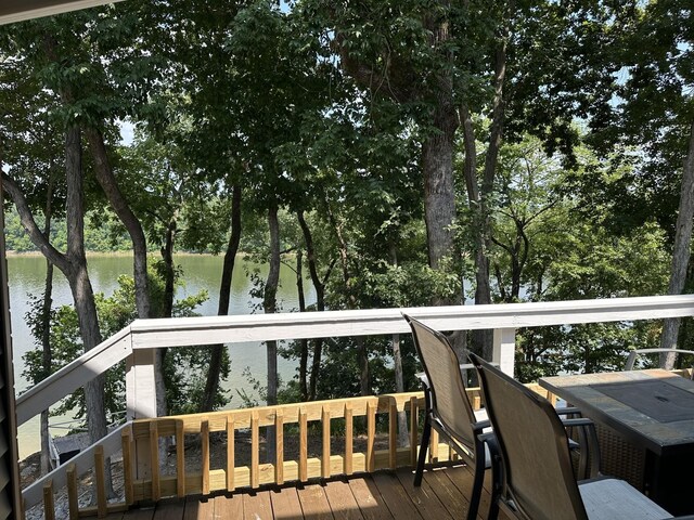 434 Hickman Shores Rd, Dover, TN 37058 - wooden deck with a water view and view of scattered trees