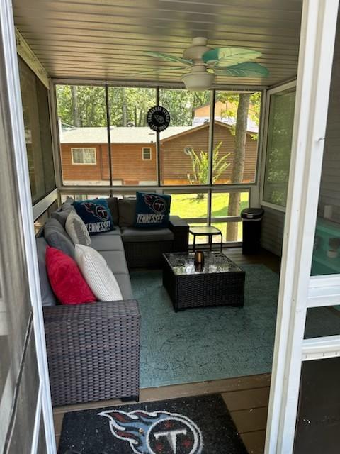 434 Hickman Shores Rd, Dover, TN 37058 - sunroom with a ceiling fan and an outdoor hangout area