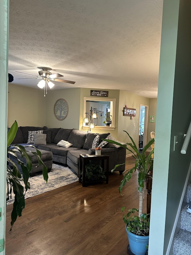 434 Hickman Shores Rd, Dover, TN 37058 - living room featuring a textured ceiling, wood finished floors, and a ceiling fan
