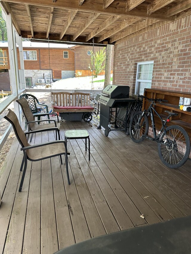 434 Hickman Shores Rd, Dover, TN 37058 - wooden deck with a grill