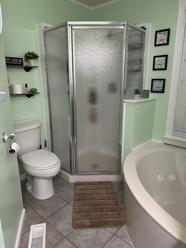 434 Hickman Shores Rd, Dover, TN 37058 - bathroom with a shower stall, a bath, tile patterned floors, and toilet
