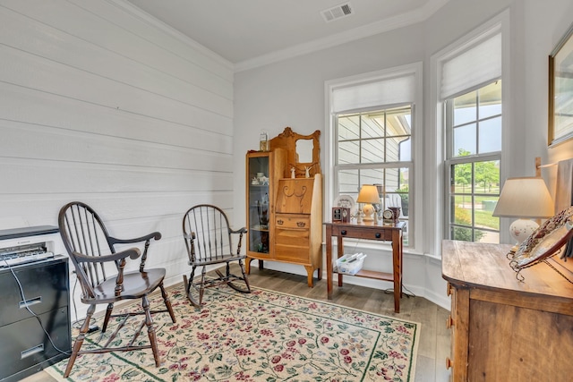 1514 Bledsoe Knl, Spring Hill, TN 37174 - living area featuring wood finished floors and ornamental molding