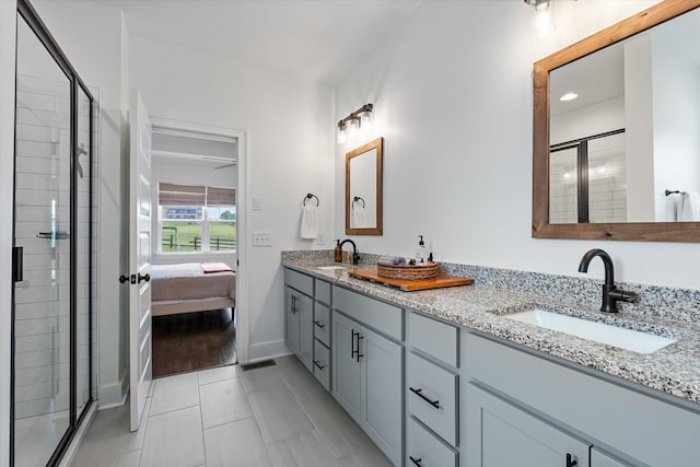 1412 Barrett Dr, Mount Juliet, TN 37122 - ensuite bathroom with a shower stall, tile patterned flooring, double vanity, and baseboards