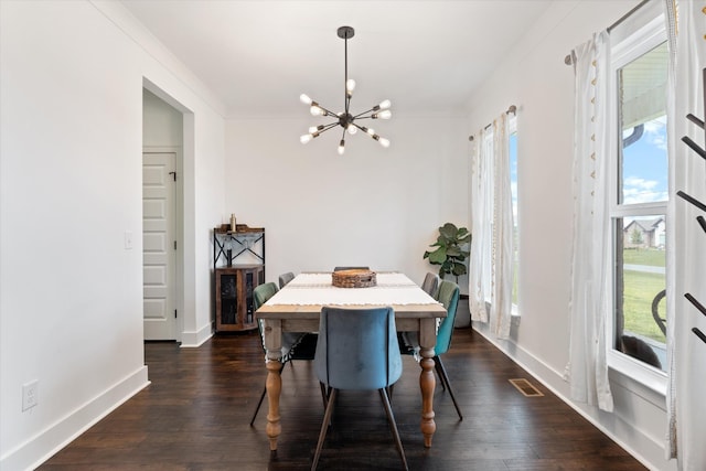 1412 Barrett Dr, Mount Juliet, TN 37122 - dining area featuring a chandelier, dark wood-style flooring, and baseboards