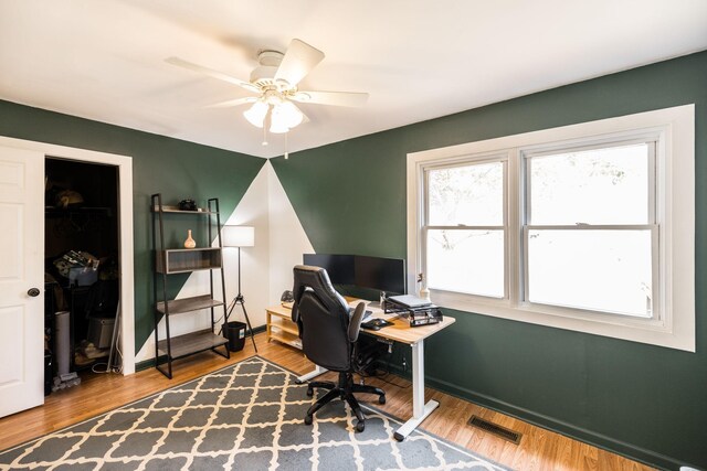 1114 Kingston Springs Rd, Kingston Springs, TN 37082 - home office featuring ceiling fan, wood finished floors, and baseboards
