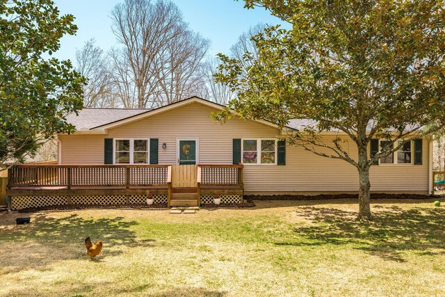 1114 Kingston Springs Rd, Kingston Springs, TN 37082 - ranch-style house with a wooden deck, a front lawn, and a shingled roof