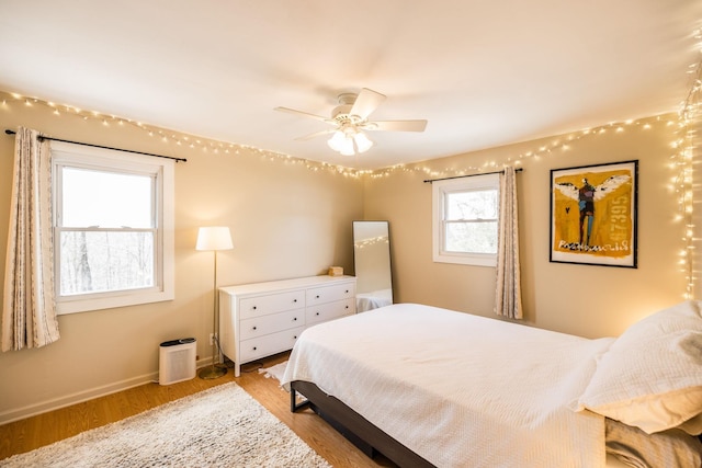 1114 Kingston Springs Rd, Kingston Springs, TN 37082 - bedroom featuring light wood-type flooring, baseboards, and ceiling fan