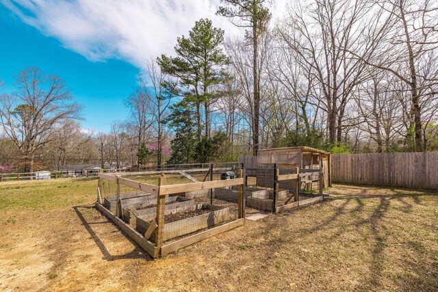 1114 Kingston Springs Rd, Kingston Springs, TN 37082 - view of yard with a garden, an outdoor structure, and exterior structure