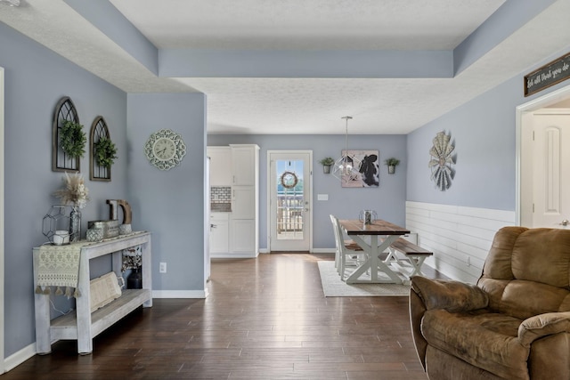 1014 Gill Hodges Rd, Portland, TN 37148 - dining room featuring dark wood-style floors and baseboards