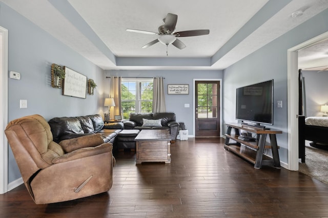 1014 Gill Hodges Rd, Portland, TN 37148 - living room with ceiling fan, a raised ceiling, baseboards, and wood finished floors