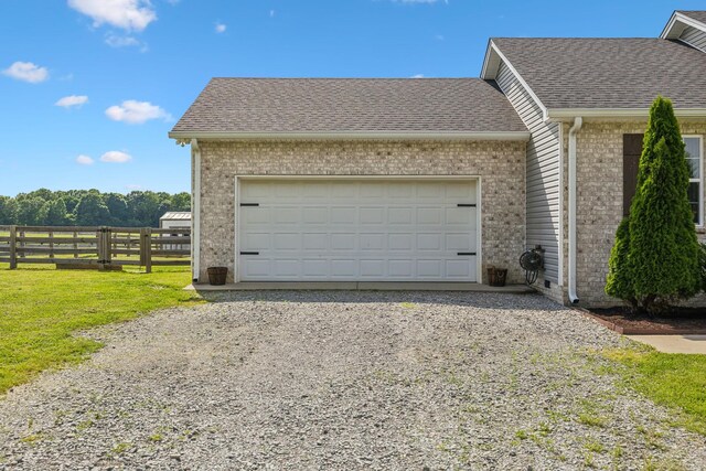 1014 Gill Hodges Rd, Portland, TN 37148 - garage featuring gravel driveway