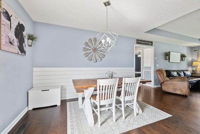 1014 Gill Hodges Rd, Portland, TN 37148 - dining space with a chandelier, wood finished floors, and baseboards