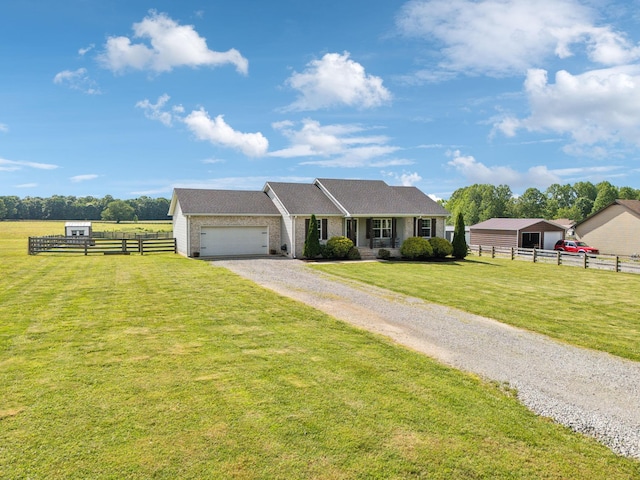 1014 Gill Hodges Rd, Portland, TN 37148 - ranch-style house featuring gravel driveway and a garage