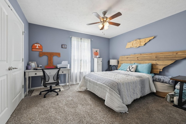 1014 Gill Hodges Rd, Portland, TN 37148 - carpeted bedroom featuring a textured ceiling, a ceiling fan, and an office area