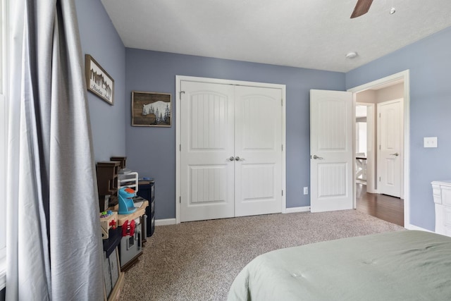 1014 Gill Hodges Rd, Portland, TN 37148 - bedroom with carpet floors, a closet, baseboards, and ceiling fan
