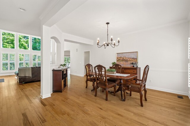1201 Banbury Row, Brentwood, TN 37027 - dining room with a chandelier, light wood-style flooring, ornamental molding, and baseboards