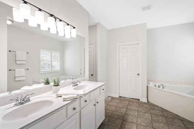 1201 Banbury Row, Brentwood, TN 37027 - full bath featuring double vanity, a bath, baseboards, and stone finish floors