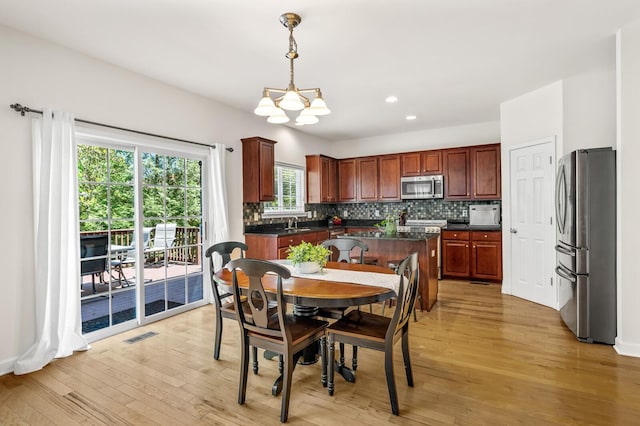 1201 Banbury Row, Brentwood, TN 37027 - dining area featuring a chandelier, light wood-style floors, and recessed lighting