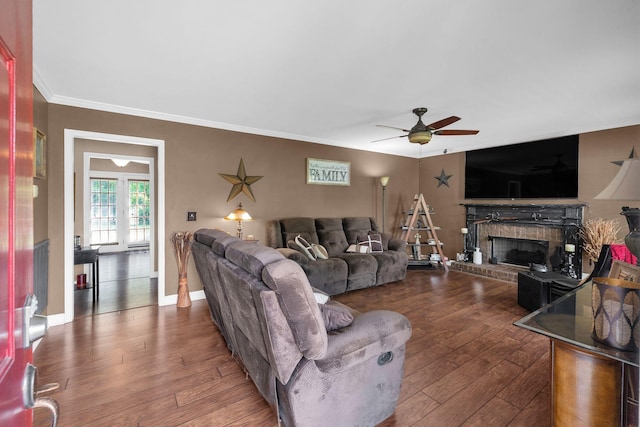 1325 Branchside Ct, Thompsons Station, TN 37179 - living area with a ceiling fan, dark wood-style floors, a fireplace, crown molding, and baseboards