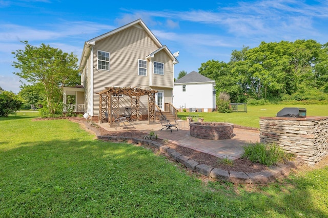 1325 Branchside Ct, Thompsons Station, TN 37179 - back of property with an outdoor fire pit, a pergola, a patio, and a yard