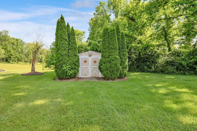 1325 Branchside Ct, Thompsons Station, TN 37179 - view of green lawn with an outdoor structure and a shed