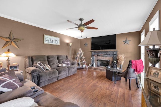 1325 Branchside Ct, Thompsons Station, TN 37179 - living area featuring a ceiling fan, hardwood / wood-style flooring, a brick fireplace, and ornamental molding