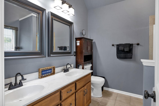 1325 Branchside Ct, Thompsons Station, TN 37179 - bathroom featuring toilet, tile patterned flooring, double vanity, and baseboards