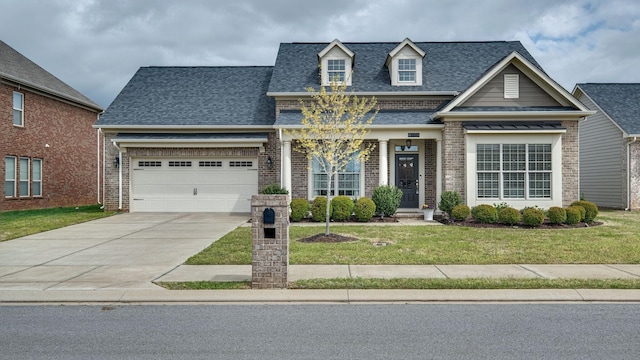 4724 Kingdom Dr, Murfreesboro, TN 37128 - view of front facade featuring a shingled roof, brick siding, and a front lawn