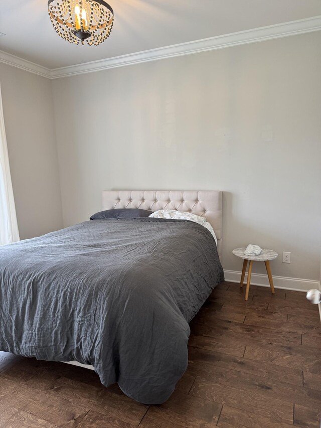 4724 Kingdom Dr, Murfreesboro, TN 37128 - bedroom featuring ornamental molding, hardwood / wood-style floors, and a chandelier
