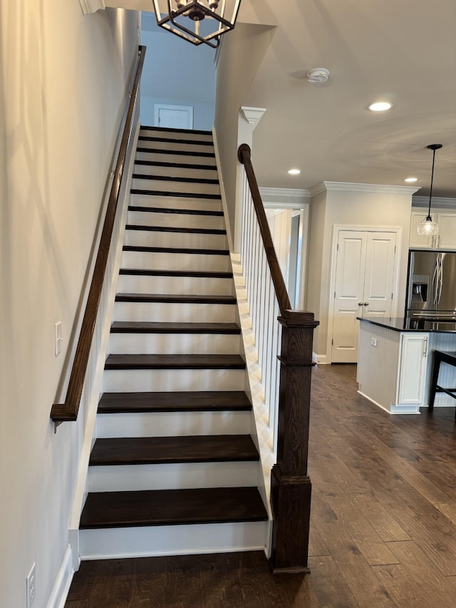 4724 Kingdom Dr, Murfreesboro, TN 37128 - staircase featuring crown molding, wood-type flooring, recessed lighting, and a chandelier