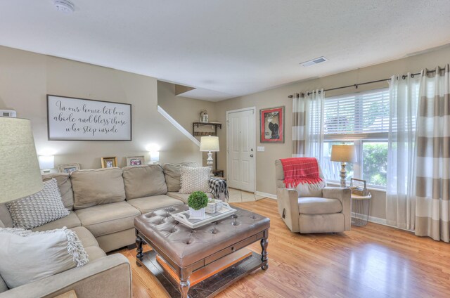 1753 Stone Hollow Ct, Hermitage, TN 37076 - living area featuring light wood-style floors and baseboards