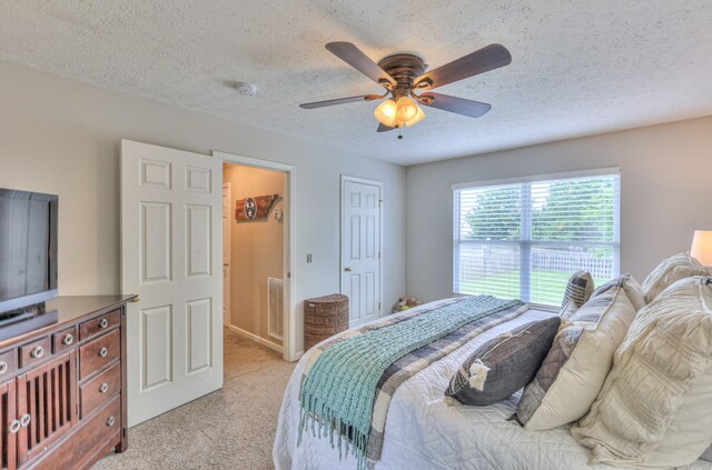 1753 Stone Hollow Ct, Hermitage, TN 37076 - bedroom with light colored carpet, a textured ceiling, ceiling fan, and a closet