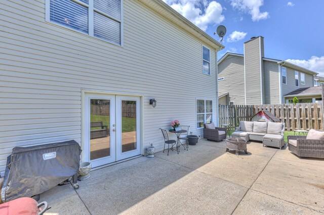 1753 Stone Hollow Ct, Hermitage, TN 37076 - view of patio / terrace featuring french doors and an outdoor living space with a fire pit