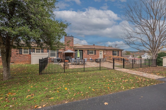 111 Proffitt St, Carthage, TN 37030 - view of front of house with brick siding and a chimney