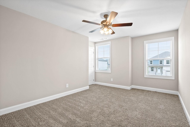 230 Cardinal Crk, Clarksville, TN 37040 - carpeted empty room with plenty of natural light, baseboards, and a ceiling fan