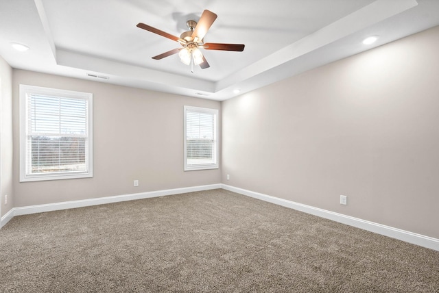 230 Cardinal Crk, Clarksville, TN 37040 - carpeted empty room with a raised ceiling, baseboards, a ceiling fan, and recessed lighting