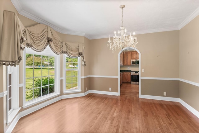 134 Blackberry Ln, Murfreesboro, TN 37130 - empty room featuring light wood-style floors, a chandelier, ornamental molding, and baseboards