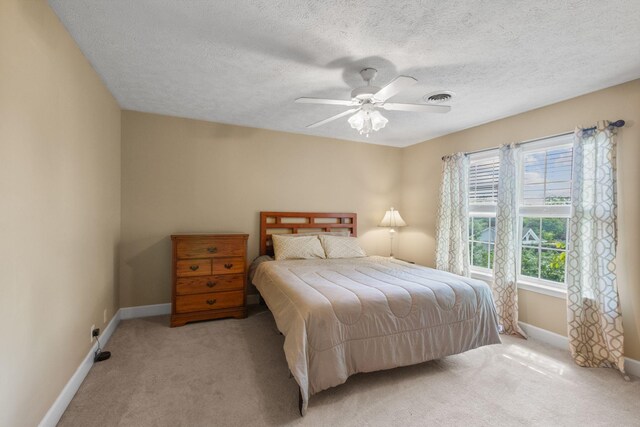 134 Blackberry Ln, Murfreesboro, TN 37130 - bedroom with light carpet, baseboards, a textured ceiling, and ceiling fan