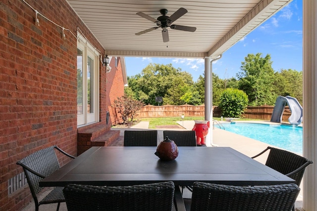 134 Blackberry Ln, Murfreesboro, TN 37130 - fenced backyard featuring entry steps, ceiling fan, and outdoor dining area