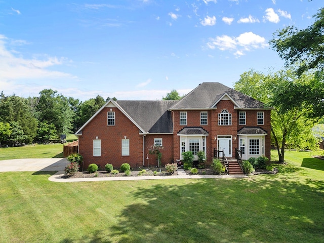 134 Blackberry Ln, Murfreesboro, TN 37130 - view of front of house with brick siding and a front lawn