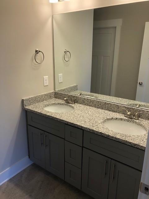 2126 Hospitality Ln, Murfreesboro, TN 37128 - full bathroom with double vanity, baseboards, and tile patterned flooring