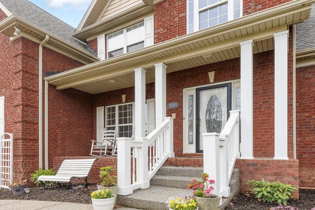 1505 Charleston Park Dr, Spring Hill, TN 37174 - entrance to property featuring brick siding and a porch