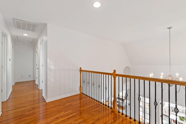 1505 Charleston Park Dr, Spring Hill, TN 37174 - hall with attic access, wood finished floors, a chandelier, recessed lighting, and baseboards
